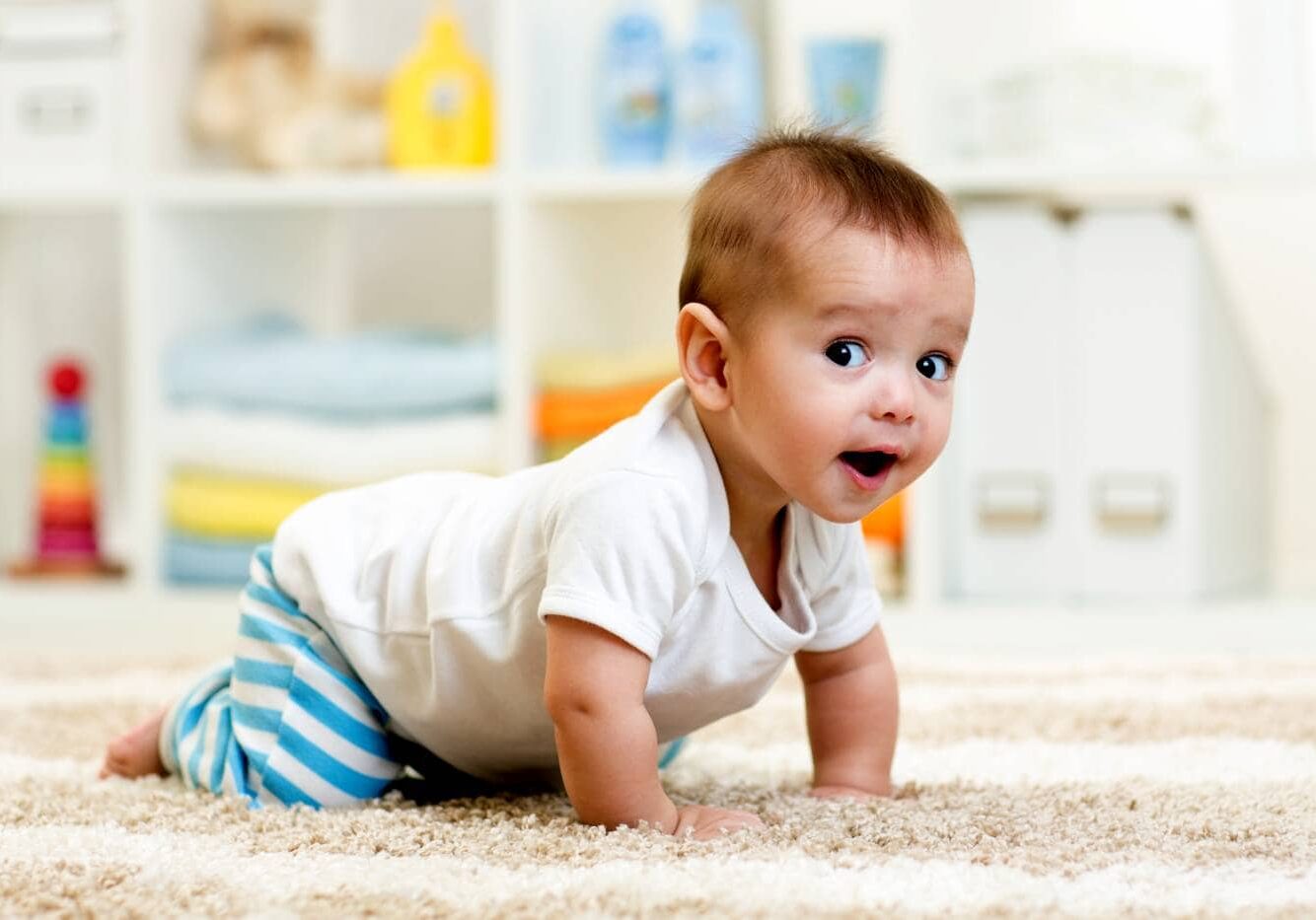 crawling baby boy indoors